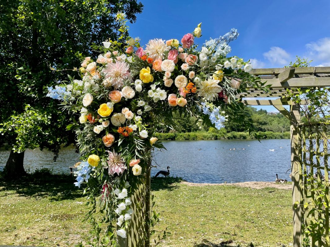 Wedding ceremony arch dressed with flowers by The Flower Lab Manchester